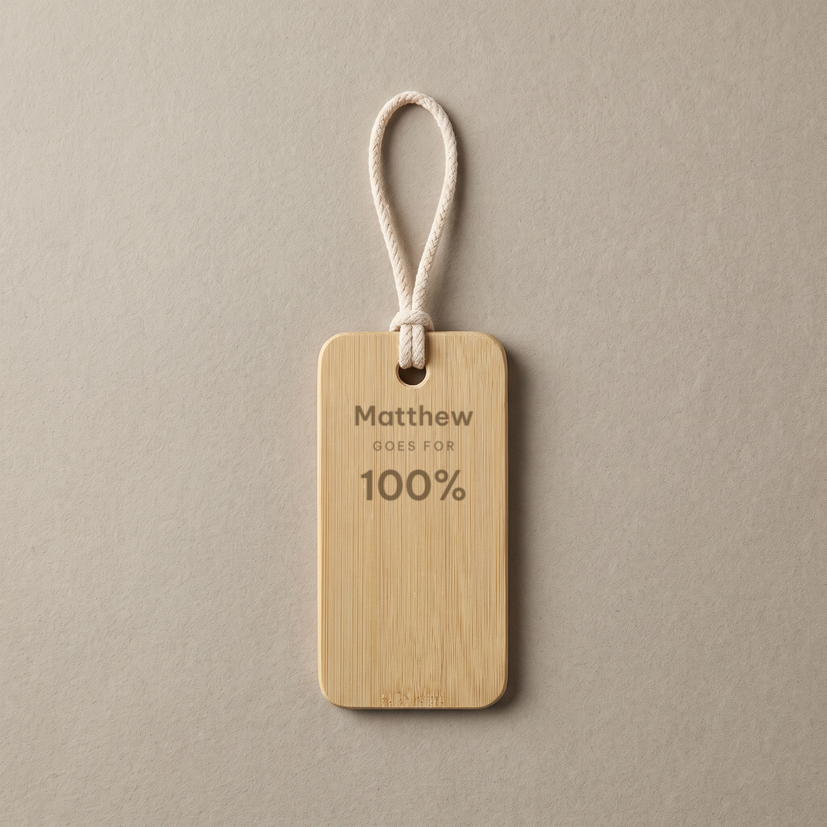 Bamboo travel tag engraved Matthew GOES FOR 100%