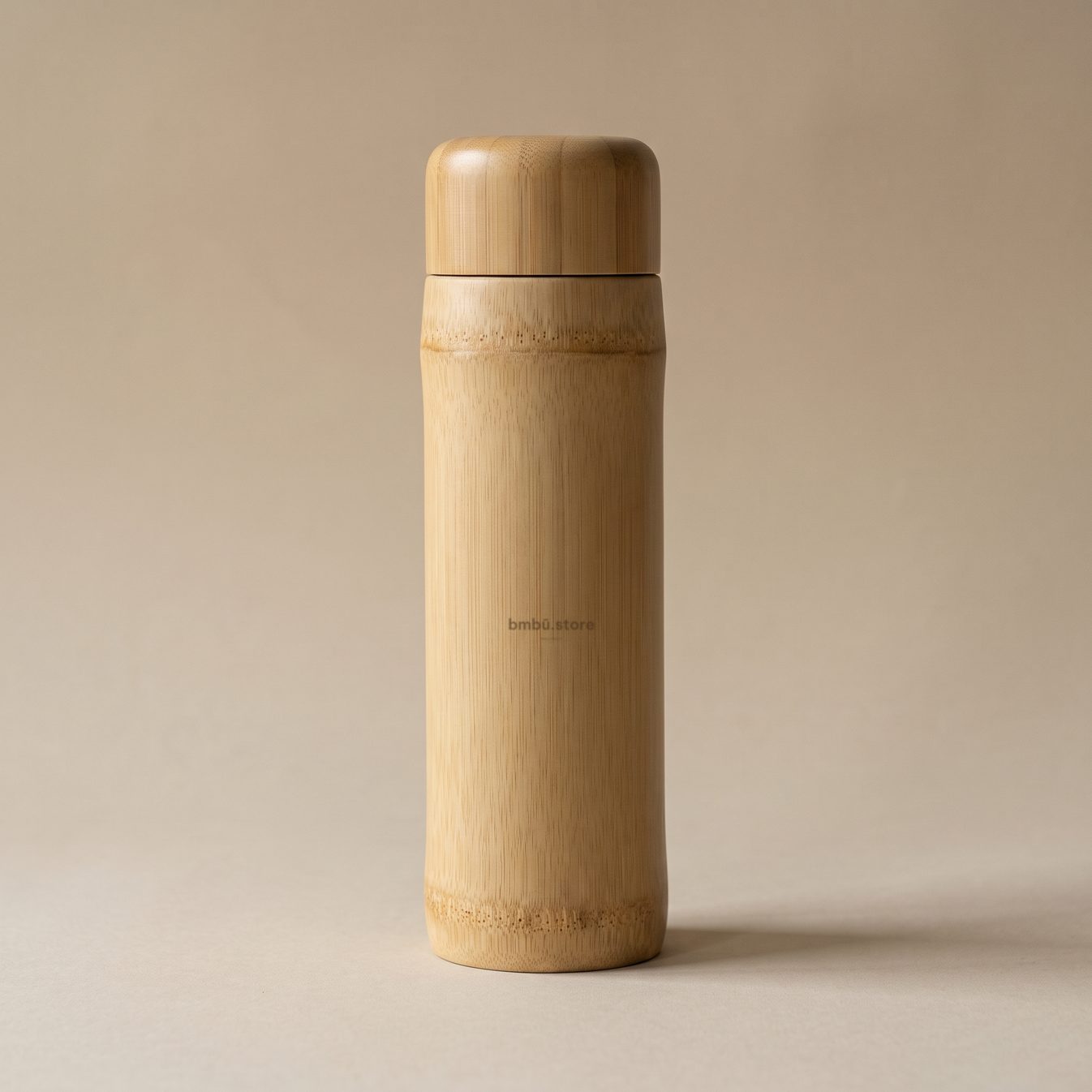 Bamboo joint flask brand face — bmbū.store wordmark
